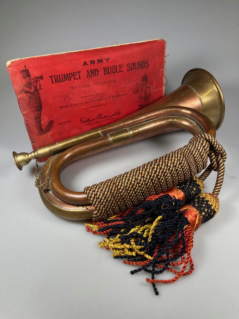 Early to mid 20th Century grouping of Bugle and Pre-WW1 Book: 'Army Trumpet and Bugle Sounds'.